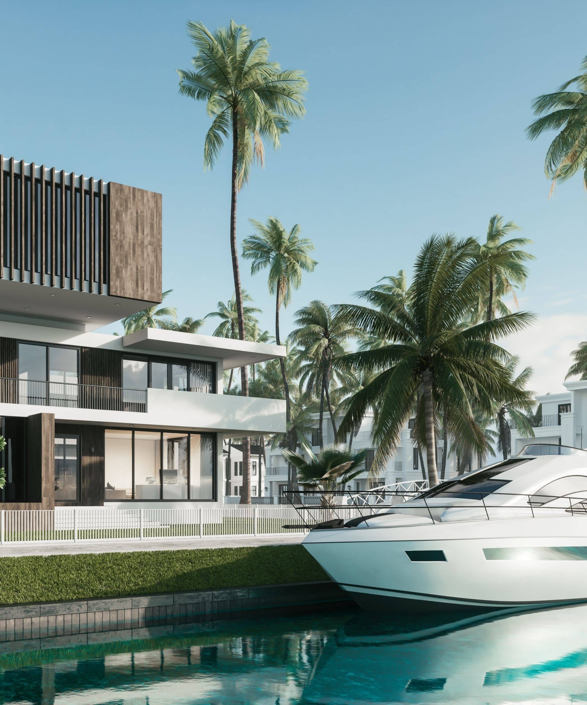 Modern waterfront home on a Naples canal, with a yacht at the dock